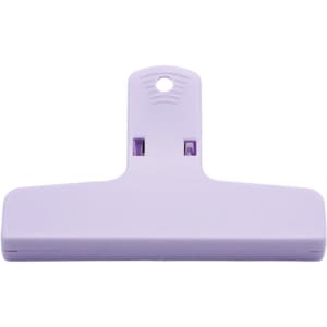 A purple plastic magnetic clip with a flat base and a loop for hanging. It features a logo on the surface.