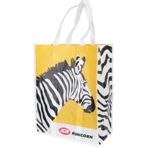 A laminated non-woven bag featuring a zebra design in black and white with a yellow background and handles.