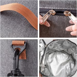 A grey cylindrical lunch bag features a zipper, a strap, a clip, and an insulated interior. It also has a logo.