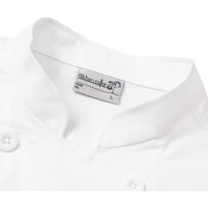 A white double-breasted chef jacket featuring a collar and button details, with a logo on the tag.