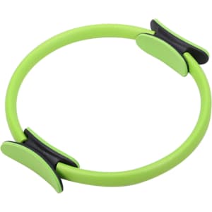 A bright green Pilates circle with black grips, designed for fitness activities. It features a smooth, rounded shape.