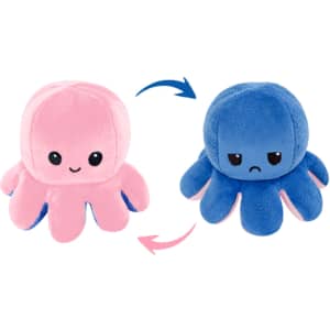 A large reversible octopus plush toy featuring pink on one side and blue on the other, with different facial expressions.