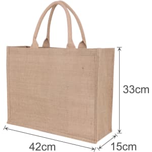 A natural jute tote bag in a light brown hue with two sturdy handles and dimensions of 42cm x 33cm x 15cm.