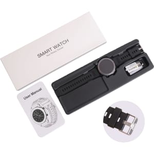 A round black smart watch with a black strap, presented in a box alongside a user manual and charging accessory.