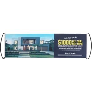 A promotional banner featuring a modern home design with a large text display. The banner has handles for easy display.
