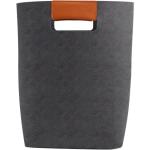 A grey felt tote bag with a brown leather handle, featuring a simple, sleek design and no visible branding.