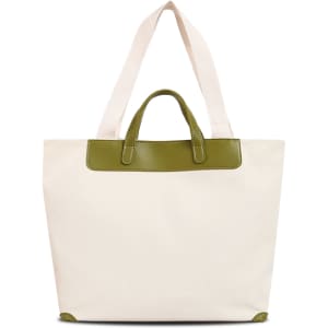 A beige canvas bag with a green leather handle and trim, featuring two long straps for carrying.