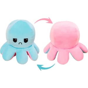 A large reversible plush octopus toy in blue and pink, featuring a cute design with contrasting expressions.