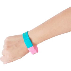A coloured wristband flash drive featuring sections in turquoise and pink, worn on a wrist.