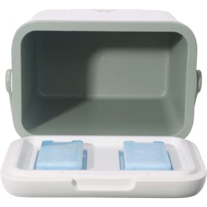 A 22L cooler box in white and green, featuring two ice packs inside. The lid is open, showcasing the spacious interior.