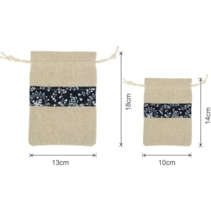 A set of cotton linen patchwork drawstring bags in beige and navy, featuring floral patterns and varying sizes.