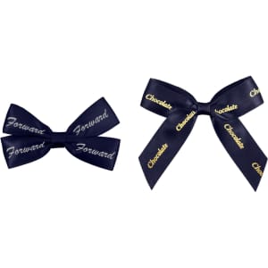 Two adhesive bows in dark blue, featuring text patterns in gold. One bow is larger and the other smaller.