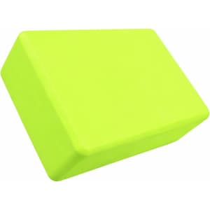 A bright green EVA yoga block with a rectangular shape, featuring a smooth surface. It has a logo on one side.