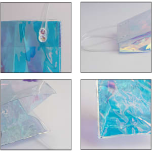 A transparent, iridescent PVC bag with blue tones and handles, featuring a zip opening and a logo.