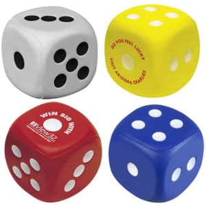 A set of four dice-shaped stress relievers in white, yellow, red, and blue, featuring dots and a logo.