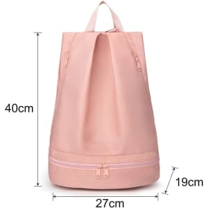 A pink backpack with a handle and two compartments, featuring a zipper on the bottom section.