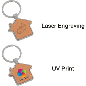 A wooden keyring shaped like a house, featuring a metal frame and a logo design on one side.