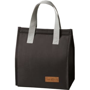 A black minimalist lunch bag with grey handles and a logo patch on the front.