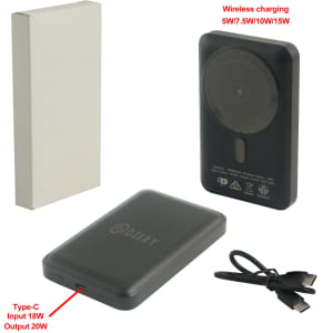 A magnetic power bank in black with wireless charging capability, accompanied by a charging cable and an unmarked box.