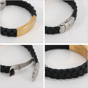 A black silicone bracelet with a metal clasp in gold and silver finishes, featuring a woven design.