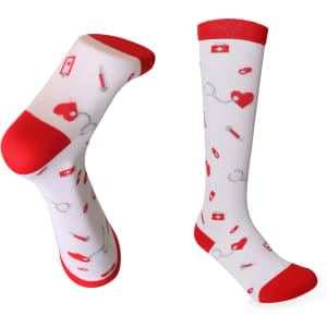 A pair of white compression socks with red accents, featuring playful patterns of hearts, band-aids, and medical symbols.