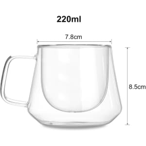 A clear double wall glass mug with a capacity of 220ml, featuring a unique geometric design and a handle.