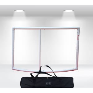 A tabletop tension fabric display frame in white, accompanied by a black carrying bag.