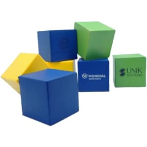 A collection of cube-shaped stress relievers in blue, green, and yellow, featuring various logos.