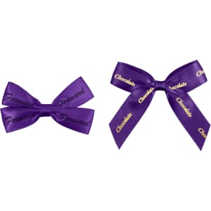 Two purple adhesive bows, one with "Forward" and the other with "Chocolate" in gold lettering.