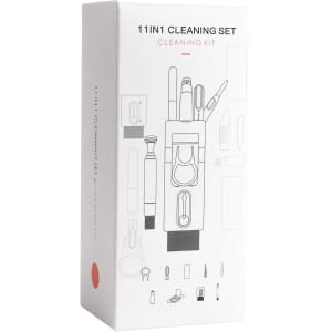 A cleaning kit box featuring various cleaning tools, predominantly in white with black and red accents. It has a logo.