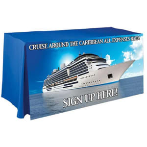 A blue, pleated tablecloth featuring an image of a cruise ship with a promotional message.