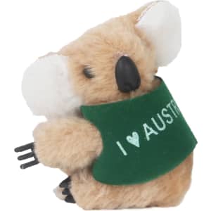 A plush koala toy with a green vest that reads "I ♥ AUSTRALIA," featuring brown fur and white accents.