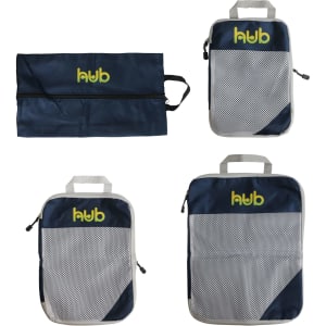Navy blue packing cubes in various sizes, featuring mesh panels and a logo, laid out in a flat arrangement.