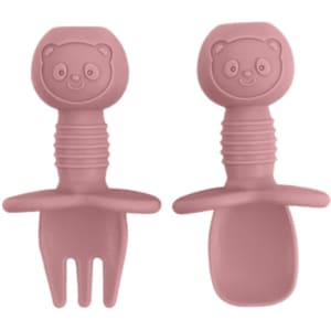 Two pieces of pink silicone cutlery for kids, featuring bear-shaped handles with smiling faces.