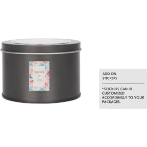 A medium grey tin can with a transparent window, featuring a decorative label and a logo.