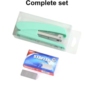 A mint green stapler in a clear packaging with a box of staples included. The box features a logo.