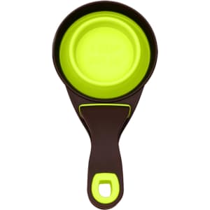 A collapsible pet food scoop in brown and bright green, featuring a round cup and a sturdy handle with a logo.