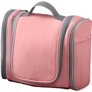 A pink travel large capacity storage bag with grey accents and zipper compartments. It has a sturdy handle for easy carrying.