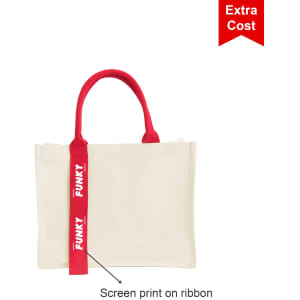 A cream horizontal canvas tote bag with red handles and a ribbon featuring a logo.