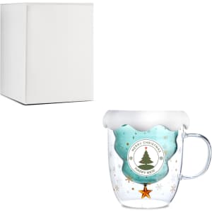 A clear glass mug with a white lid resembling snow, featuring a festive design and an included plain white box.