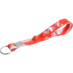 A red and white Popper Stress Reliever Keyring with multiple push buttons and a metal keyring attachment.