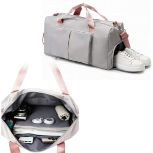 A foldable sports duffle bag in grey with pink straps, featuring multiple pockets and compartments for storage.