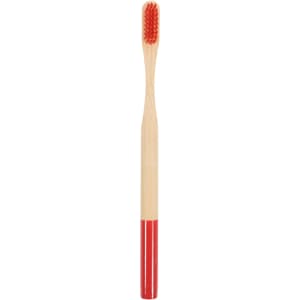 A colorful bamboo toothbrush with a red handle and a natural bamboo bristle head. It has a logo on the handle.