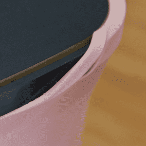 A pink Triangle Popup Booth features a sleek black top edge, designed for exhibitions and events.