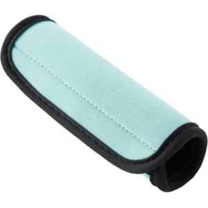 A mint green neoprene luggage grip with black trim and a distinctive logo.