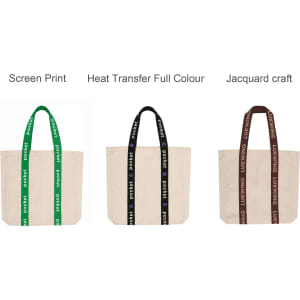 A custom woven handle tote bag in natural colour with green, black, and brown handle options, featuring branding.