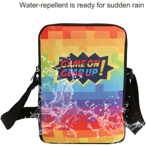 A vibrant, rainbow-coloured sublimation cross body bag with a black strap and a water-repellent surface.