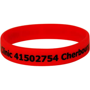 A red silicone wristband featuring black text and a logo.