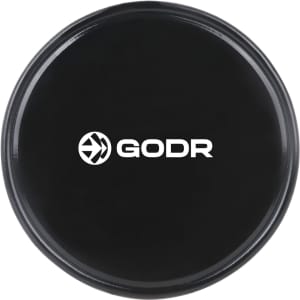 A round, black sticky pad with a logo in the centre, designed for holding small items securely.