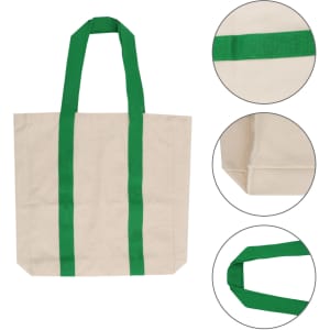 A personalised canvas tote bag in natural colour with green straps and corners. Features a logo.